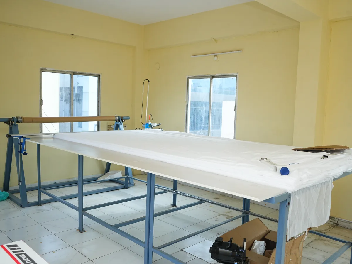 Material cutting table inside Devishree Health Care unit