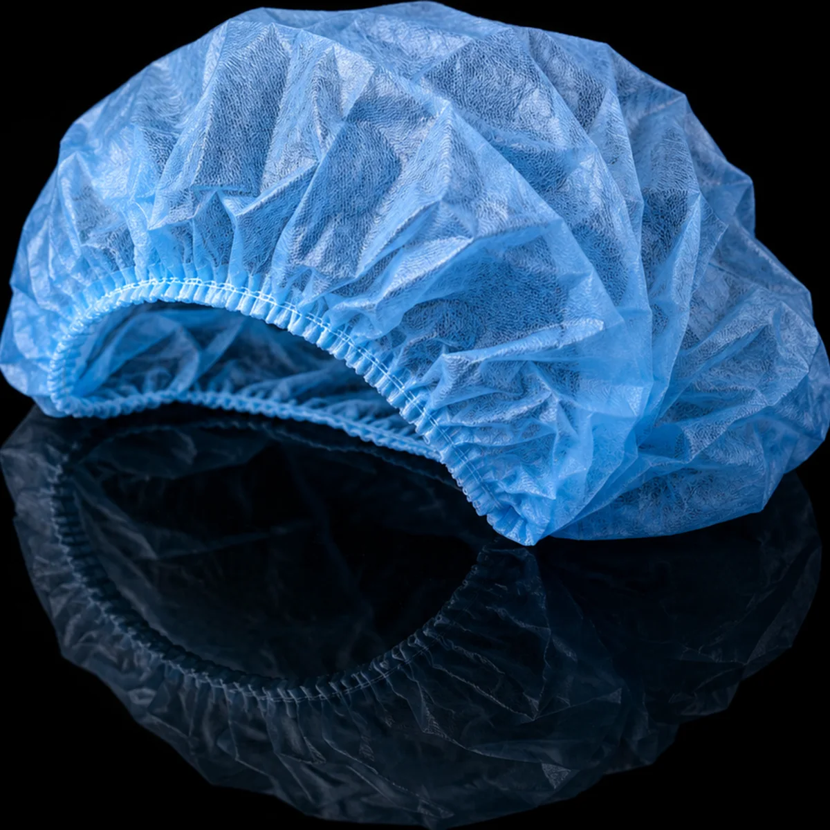 Blue disposable head cap product photo