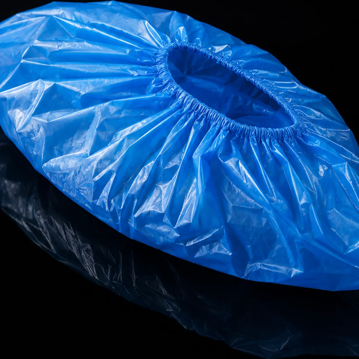 Blue disposable shoe cover product photo