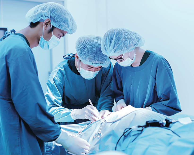 Medical team using disposable protective apparel in a clinical setting